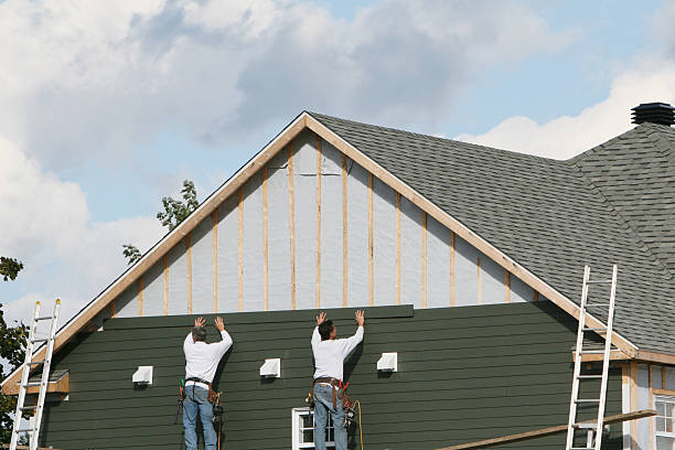 Professional Siding technician working in Free Union, VA